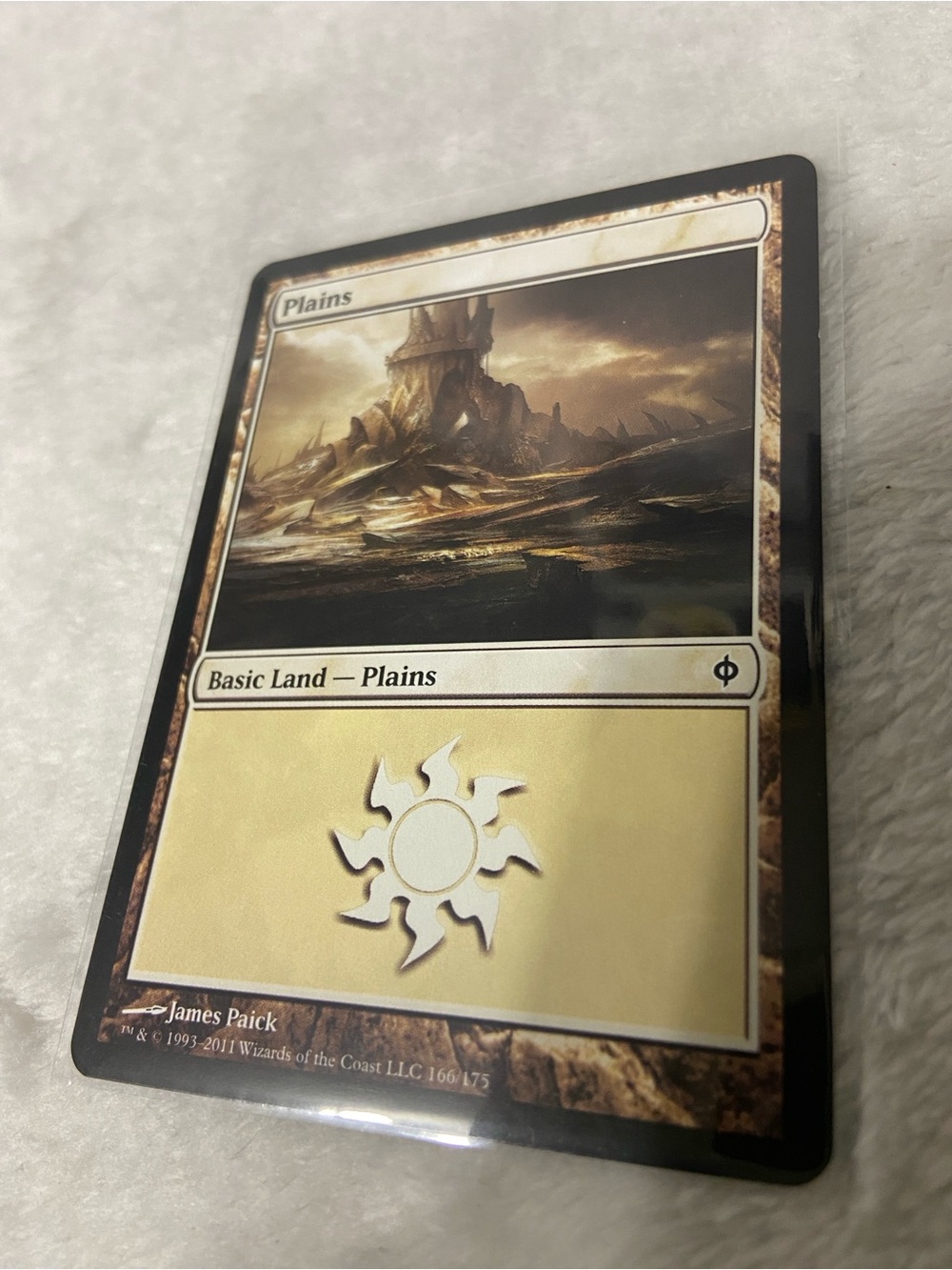 Plains #166/175 New Phyrexia